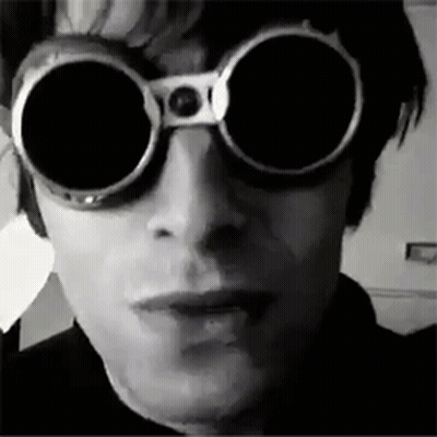 Man In Goggles Making Face Black And White GIF