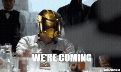 Man In Gold Helmet Saying We're Coming GIF