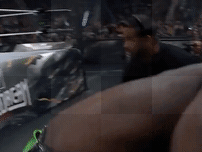 Man In Gold Jacket In Wrestling Ring GIF