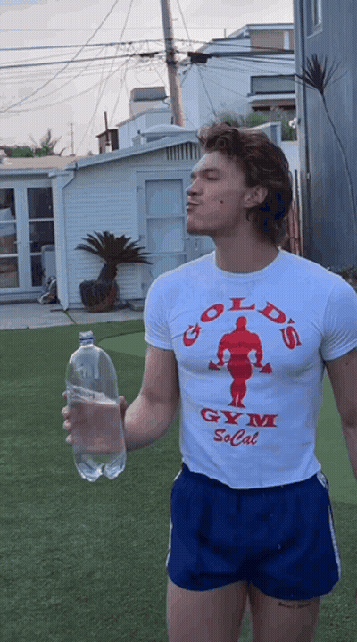 Man In Gold S Gym Shirt Drinking Water GIF