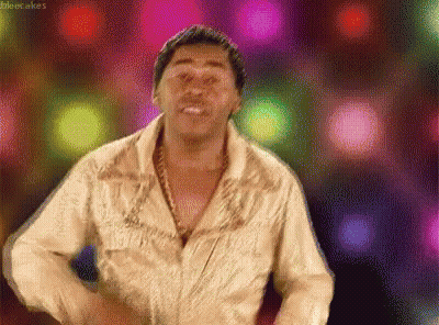 Man In Gold Shirt Dancing Silent Cakes GIF