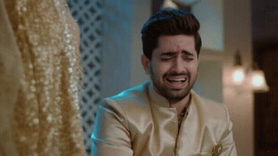 Man In Gold Suit Crying Watching Woman In Gold Dress GIF