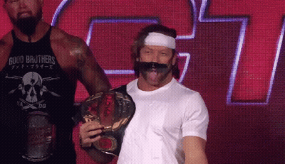 Man In Good Brothers Shirt Holding Belt GIF