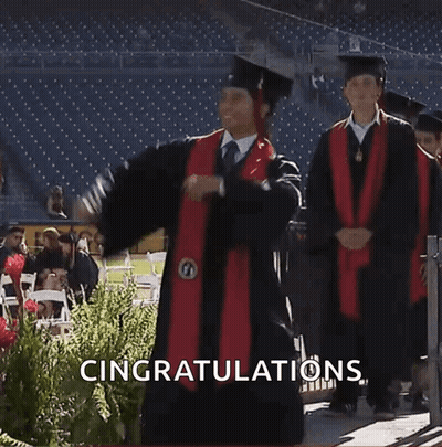 Man In Graduation Cap And Gown Celebrating GIF
