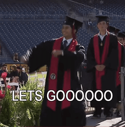 Man In Graduation Cap And Gown Kneeling GIF
