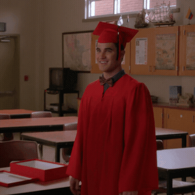 Man In Graduation Cap And Gown GIF