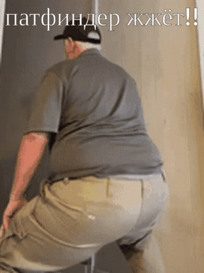 Man In Gray And Khaki At Pathfinder Jxket Sign GIF