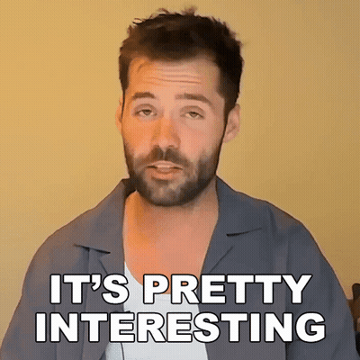 Man In Gray Shirt And Glasses Says This Is Interesting GIF