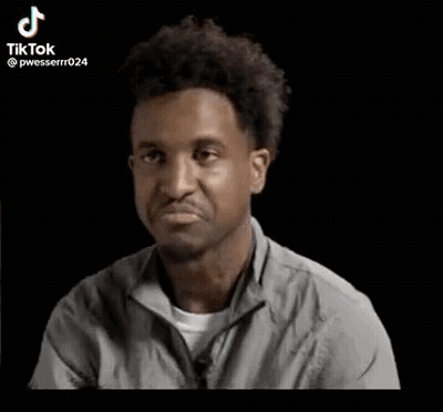 Man In Gray Shirt Making Funny Face GIF