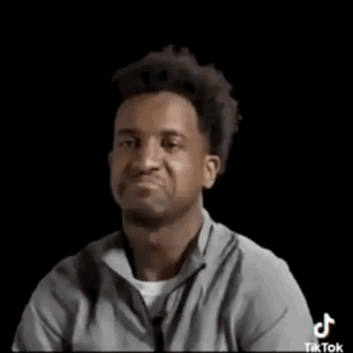Man In Gray Shirt Making Funny Face GIF