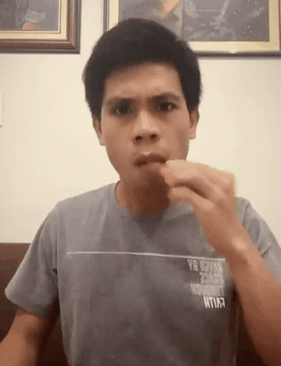 Man In Gray Shirt Saying Exile GIF