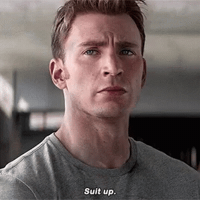 Man In Gray Shirt Saying Suit Up GIF