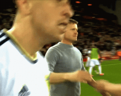 Man In Gray Shirt Shakes Hands With Man In White Shirt GIF