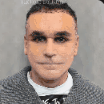 Man In Gray Sweater And White Shirt GIF
