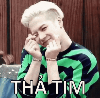 Man In Green And Black Sweater Making Heart With Hands GIF