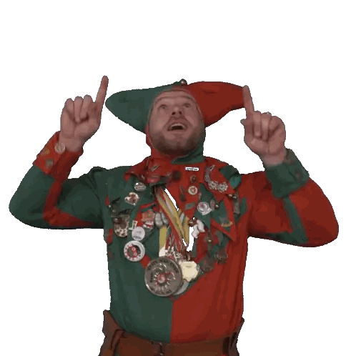Man In Green And Red Outfit With Badge Sticker
