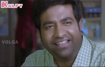 Man In Green And White Checkered Shirt Smiling GIF