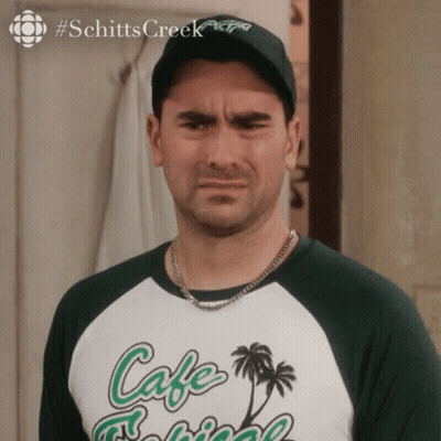 Man In Green And White Shirt Saying Cafe Pacific GIF