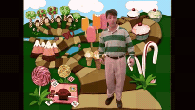 Man In Green And White Striped Shirt In Candy Land GIF