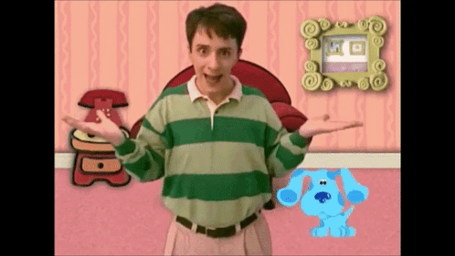 Man In Green And White Striped Shirt Next To Blue Dog GIF