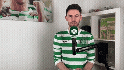 Man In Green And White Striped Shirt Talking GIF