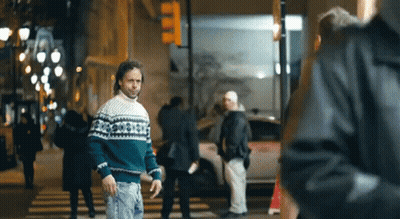 Man In Green And White Sweater Walking GIF
