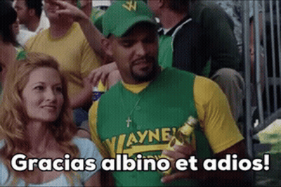 Man In Green And Yellow Jersey Says Gracias Albino Et Adios GIF