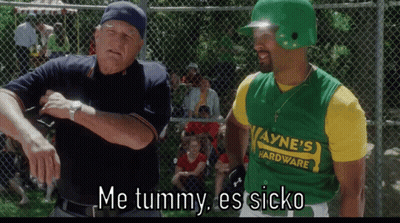 Man In Green And Yellow Wayne's Hardware Jersey Next To Another Man GIF