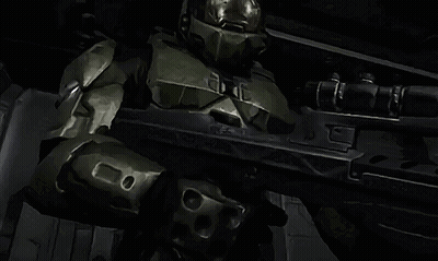 Man In Green Armor Holding Rifle With Letter E GIF