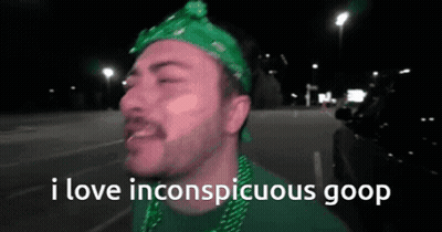 Man In Green Bandana And Beads Says I Love Inconspicuous Goop GIF