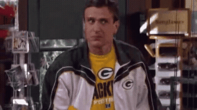 Man In Green Bay Packers Jacket And Yellow Shirt GIF