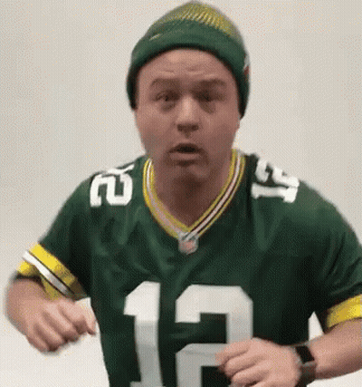 Man In Green Bay Packers Jersey And Beanie Dancing GIF