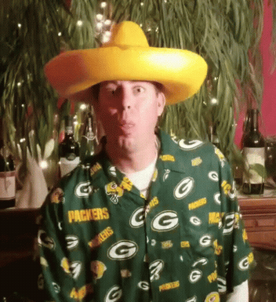 Man In Green Bay Packers Shirt Blowing A Kiss GIF