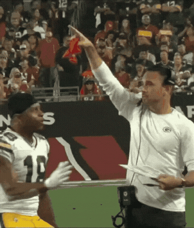 Man In Green Bay Packers Shirt Talks To Player GIF