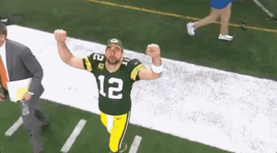 Man In Green Bay Packers Uniform Running On Football Field GIF