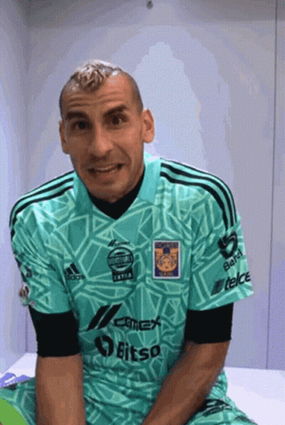 Man In Green Bitsa Shirt GIF