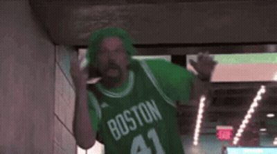 Man In Green Boston 41 Jersey Walking Through Hallway GIF