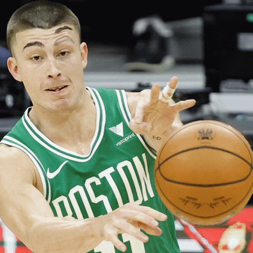 Man In Green Boston Jersey Holding Basketball GIF