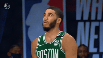 Man in Green Boston Jersey Looking Up