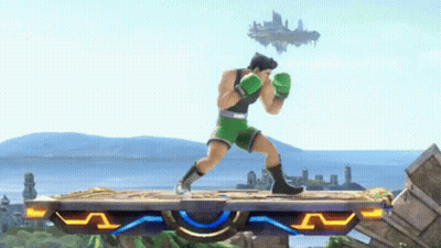 Man In Green Boxing Gloves On Platform GIF
