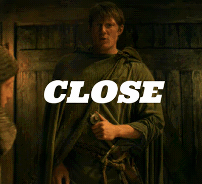 Man In Green Cape Holding Sword GIF