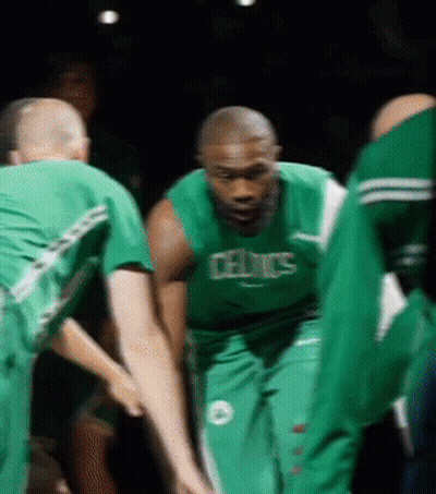 Man In Green Celtics Jersey Huddling With Players GIF