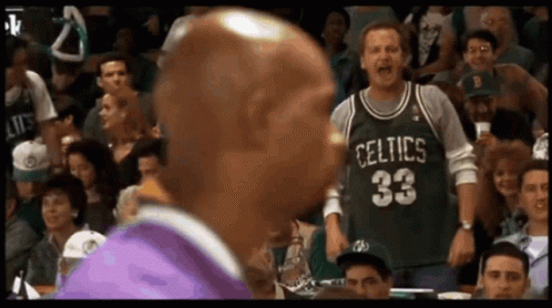 Man In Green Celtics Jersey In Crowd GIF
