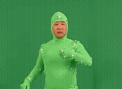 Man In Green Costume GIF