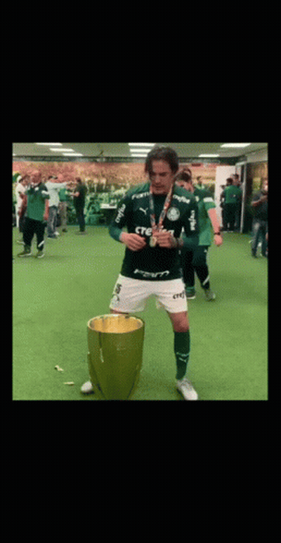 Man In Green Crefisa Shirt Before Trophy GIF
