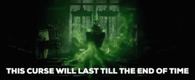 Man In Green Dress Surrounded By Green Smoke GIF