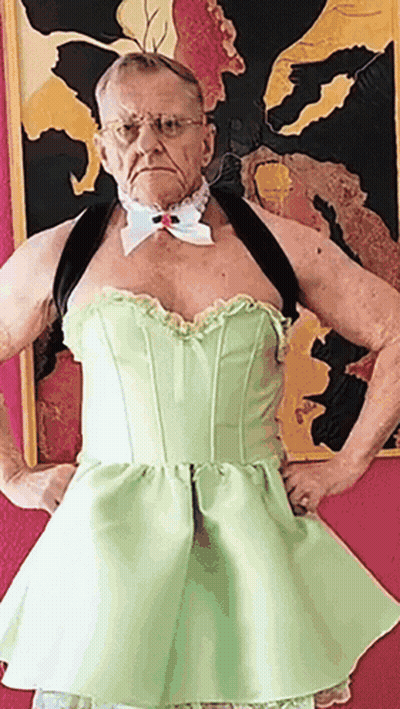 Man In Green Dress With Bow Tie GIF