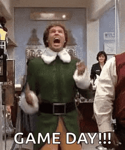 Man In Green Elf Costume Celebrating GIF