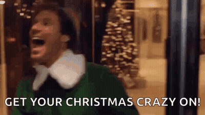 Man In Green Elf Costume Laughing GIF