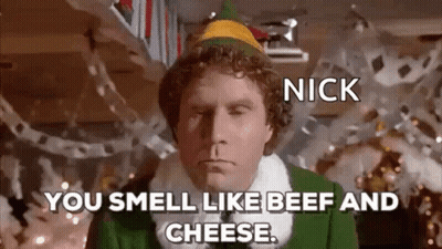 Man In Green Elf Costume Saying You Smell Like Beef And Cheese GIF